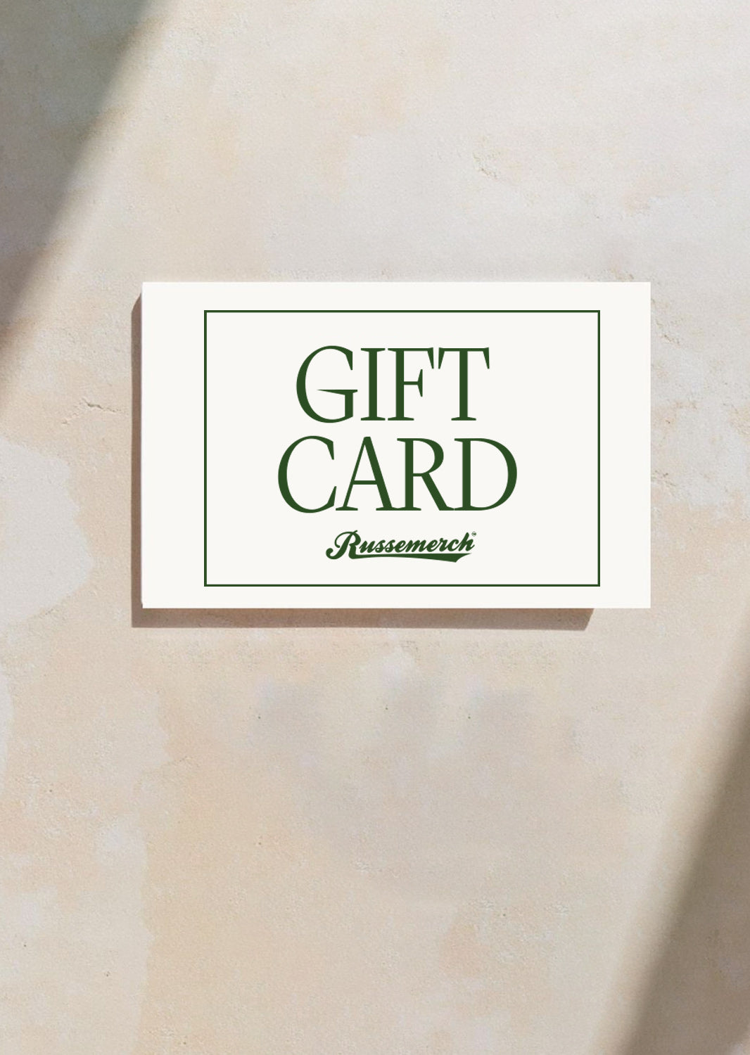 Gift card with 'Russemerch' branding on a beige background